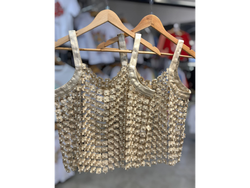 Musculosa dorado piedras