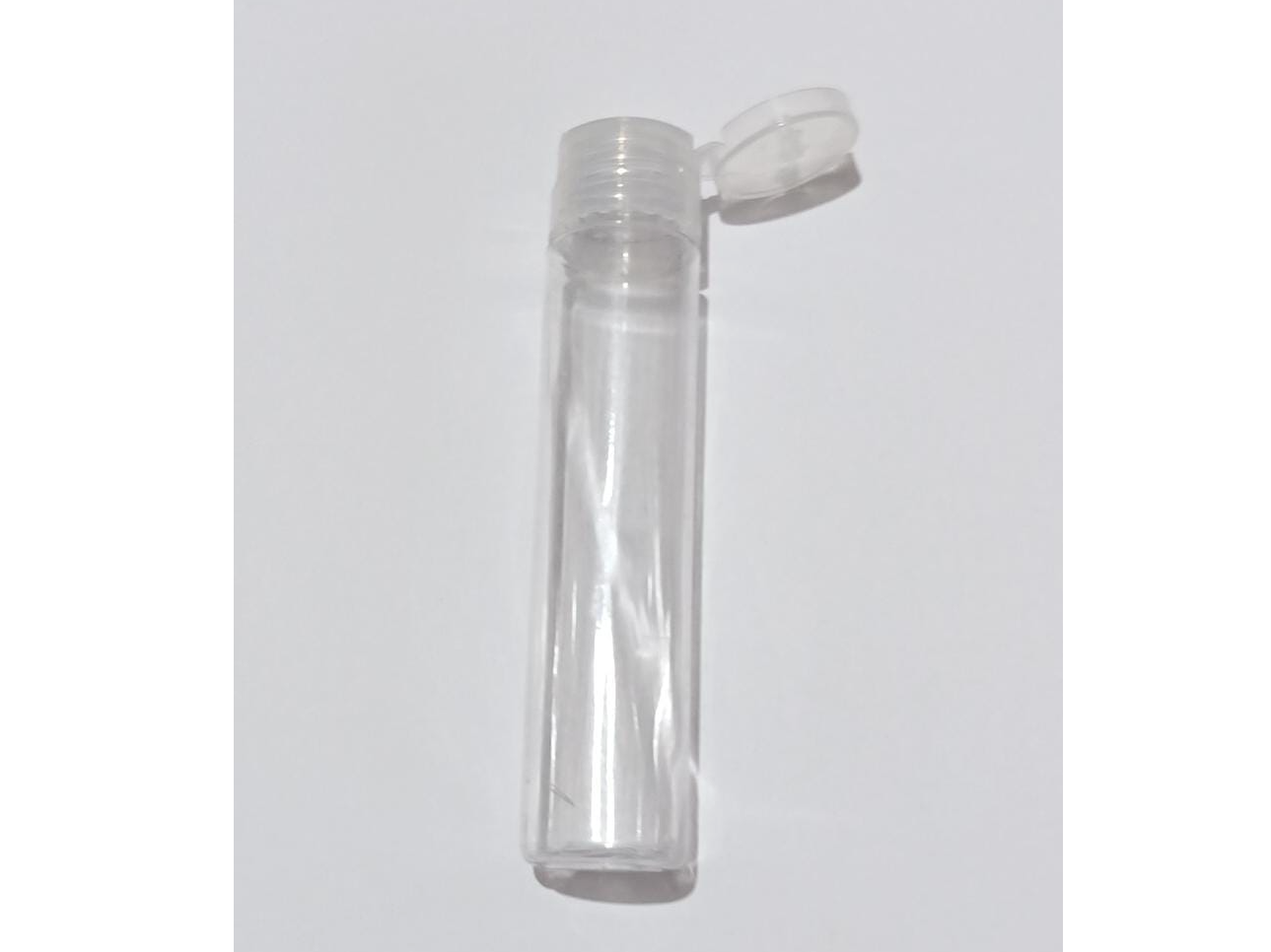 ENVASE PVC CIRCULAR ALARGADO 60 CC. CON TAPA FLIP TOP