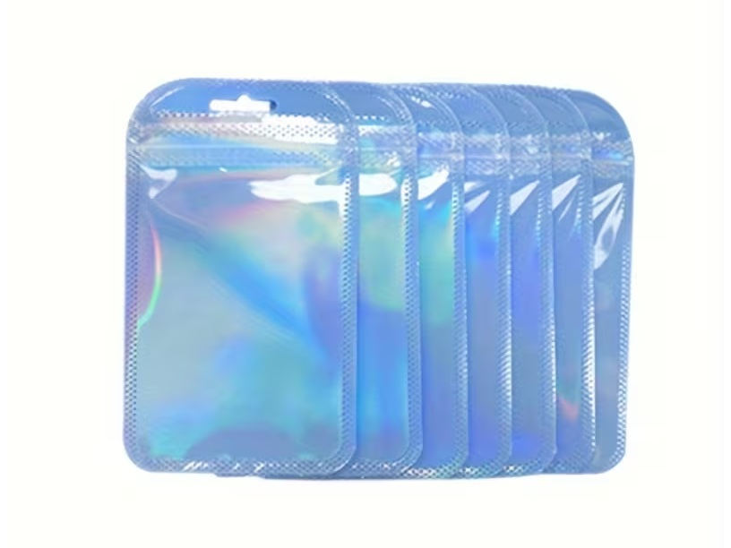 BOLSA  **CELESTE ** HOLOGRAFICAS  CIERRE HERMETICO