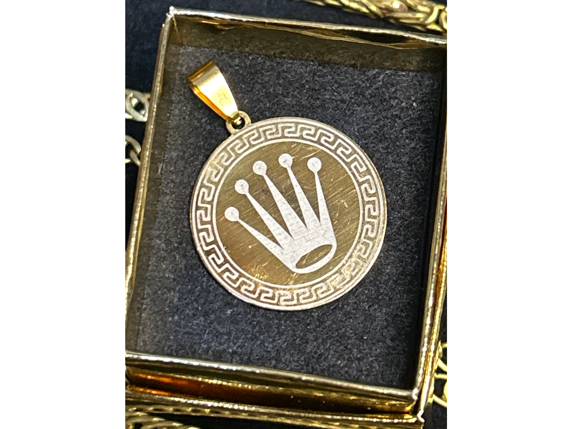 Medalla redonda ROLEX