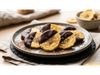 Banana con chocolate semiamargo x Kg