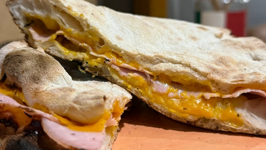 Combo sándwich + papitas + lata gaseosa
