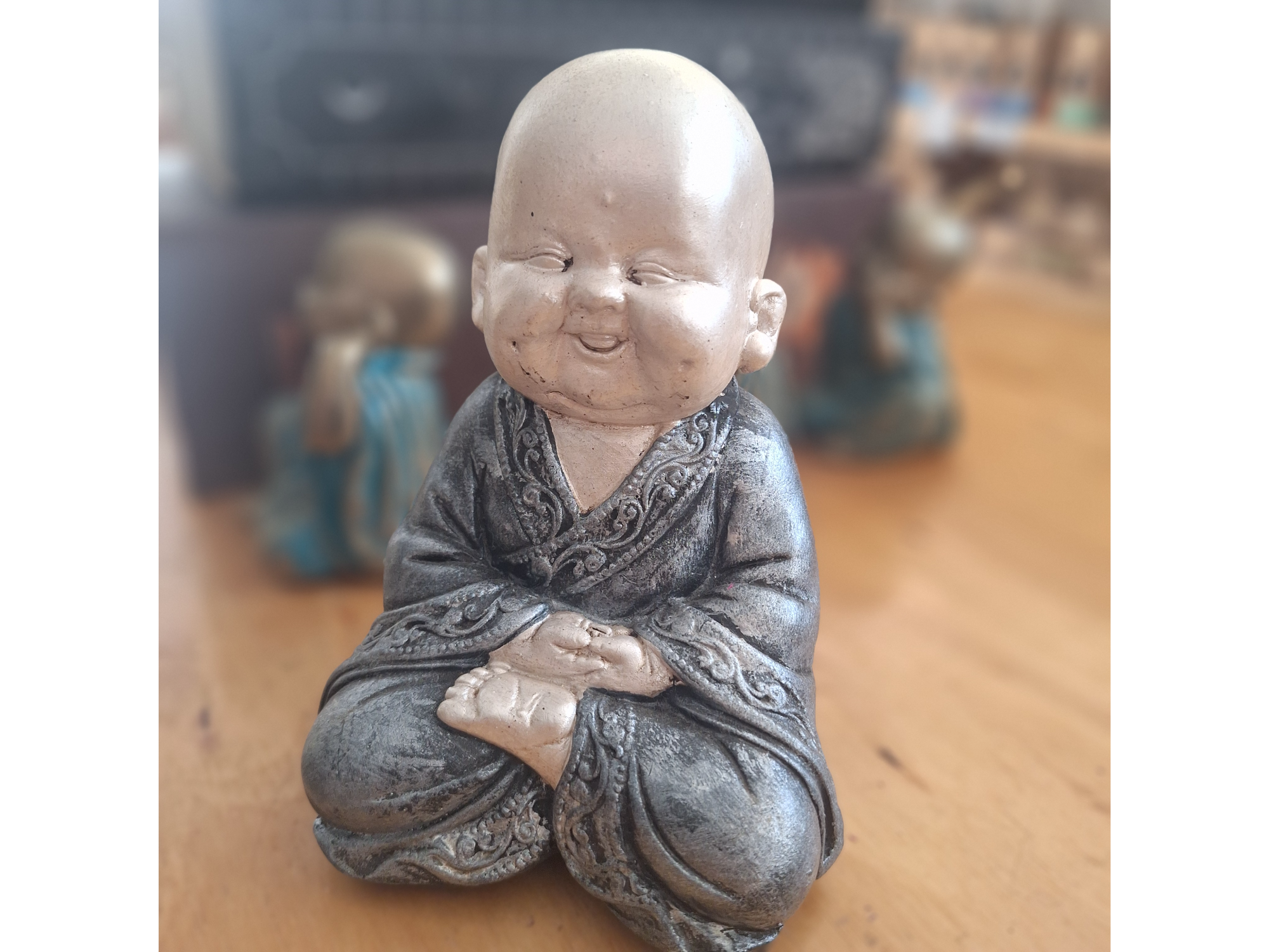 Buda Pelado Sonriente