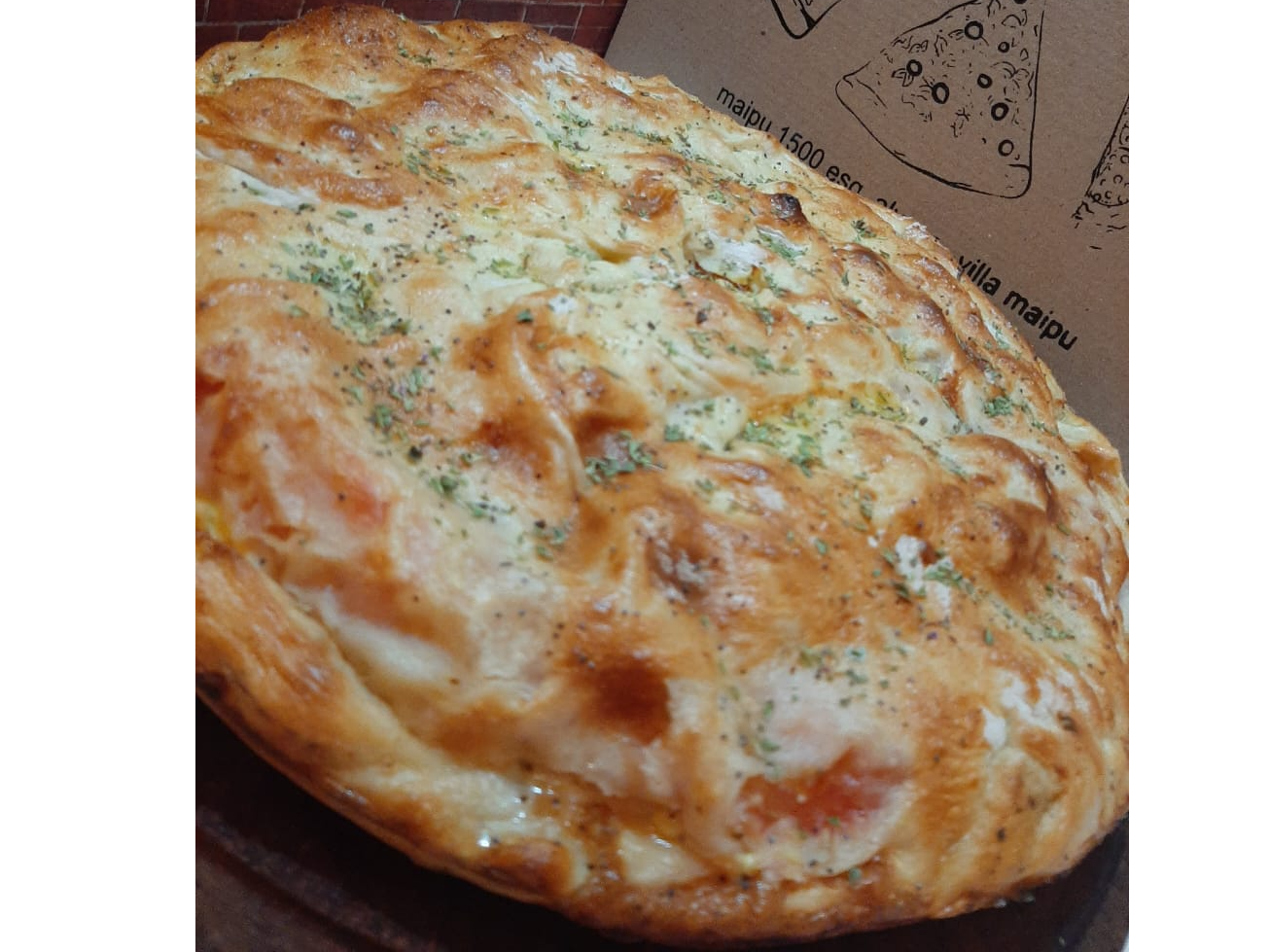 Calzone Primavera de Cha-Cha Pizzeria Tradicional