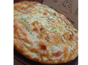 Calzone Primavera de Cha-Cha Pizzeria Tradicional