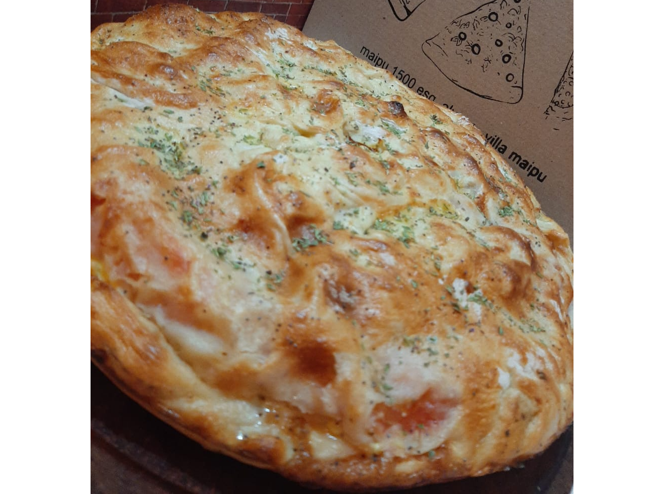 Calzone Calabrese de Cha-Cha Pizzeria Tradicional