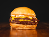 Cheeseburger Doble con papas