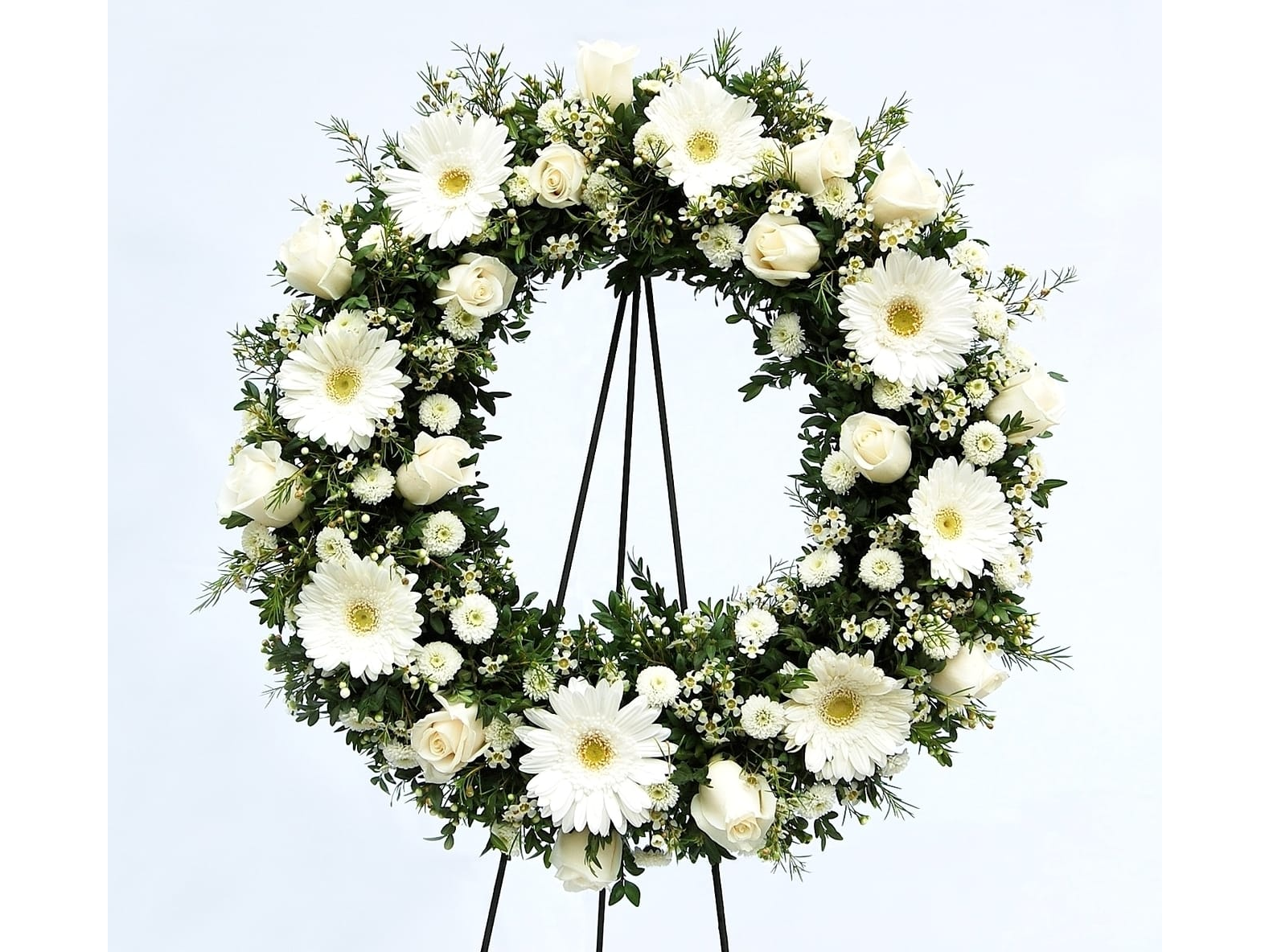 CORONA ESPECIAL ROSAS, GERBERAS Y POLARIS