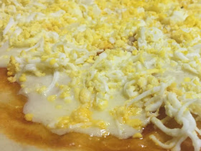 Pizza con huevos