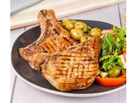 Costillita de Cerdo Con Salsa Criolla + Guarnición