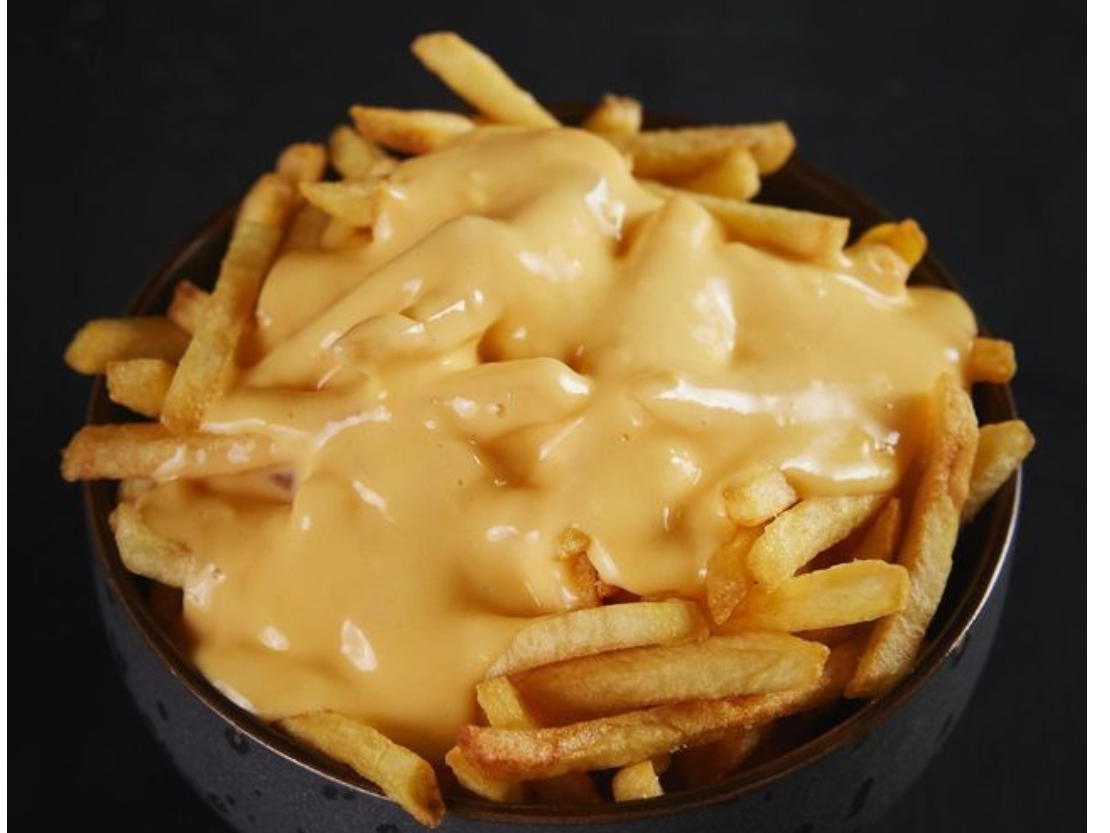 PAPAS GRANDES CON CHEDDAR