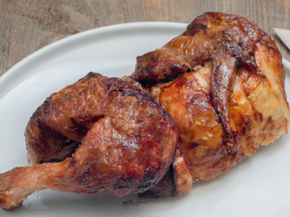 Medio pollo asado a las brasa