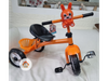 triciclo musical, musica y luces