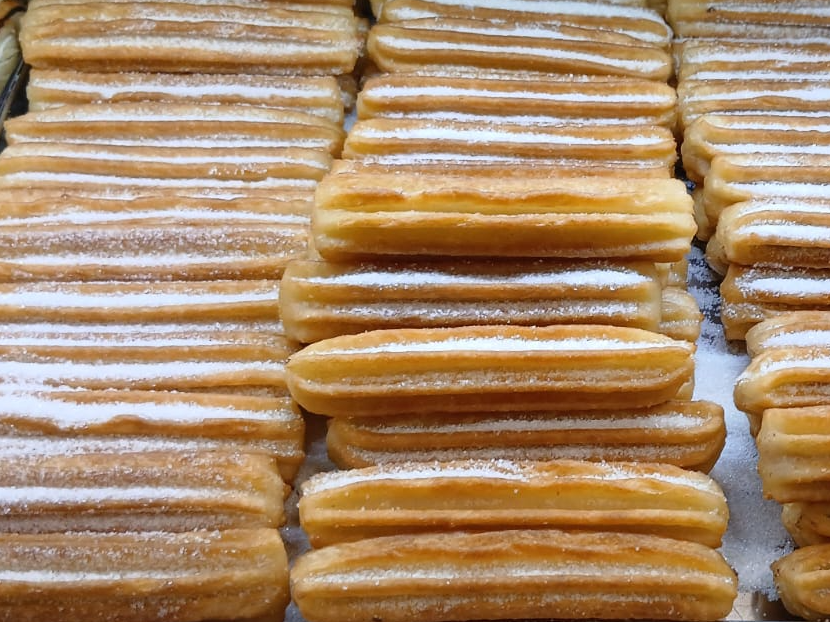 Churro con dulce de leche