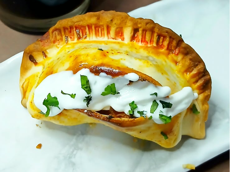bondiola braseada y alioli de Empanadukis
