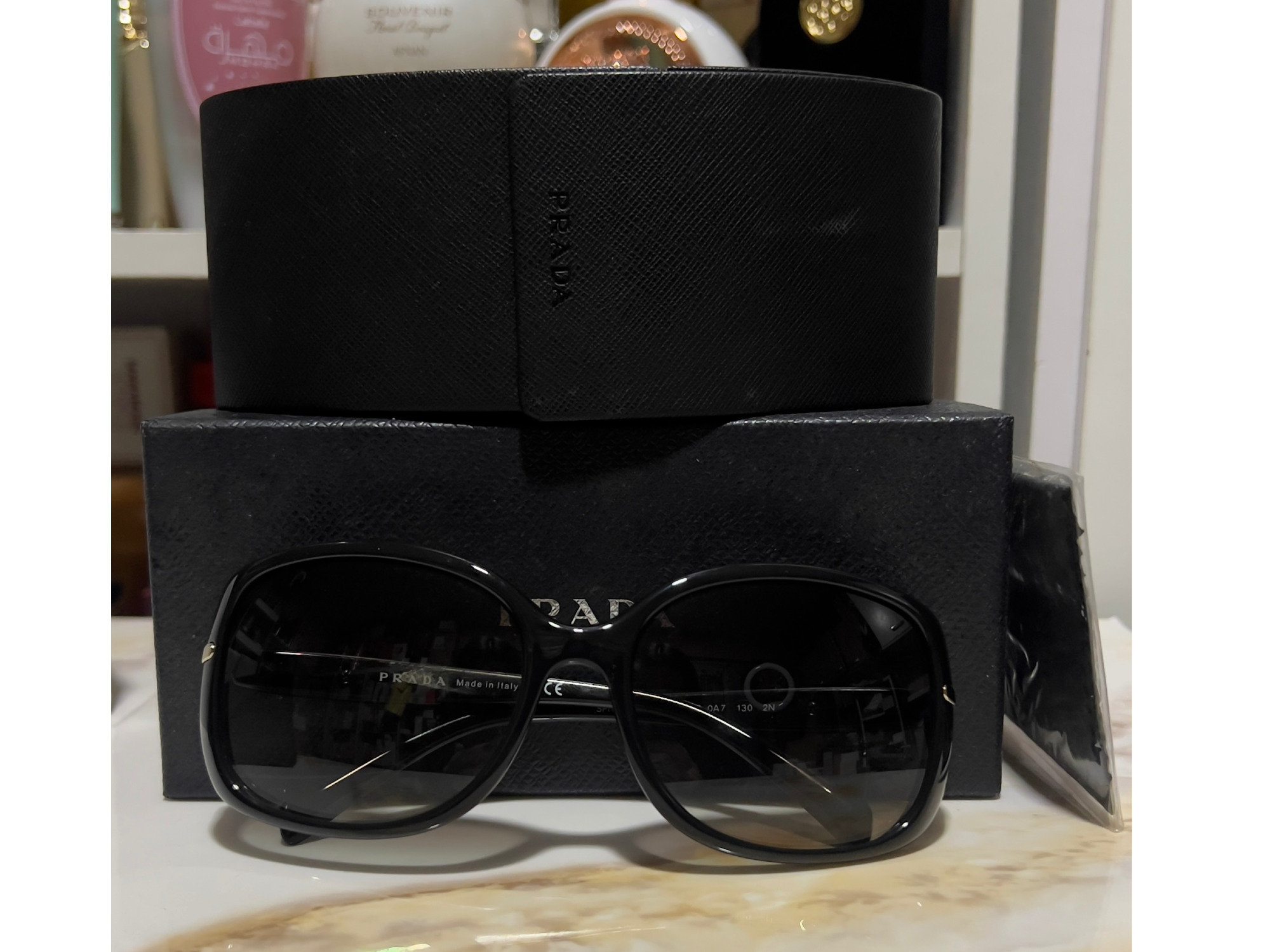 Lentes PRADA SPR 08O 57 17 130 1AB-0A7 2N