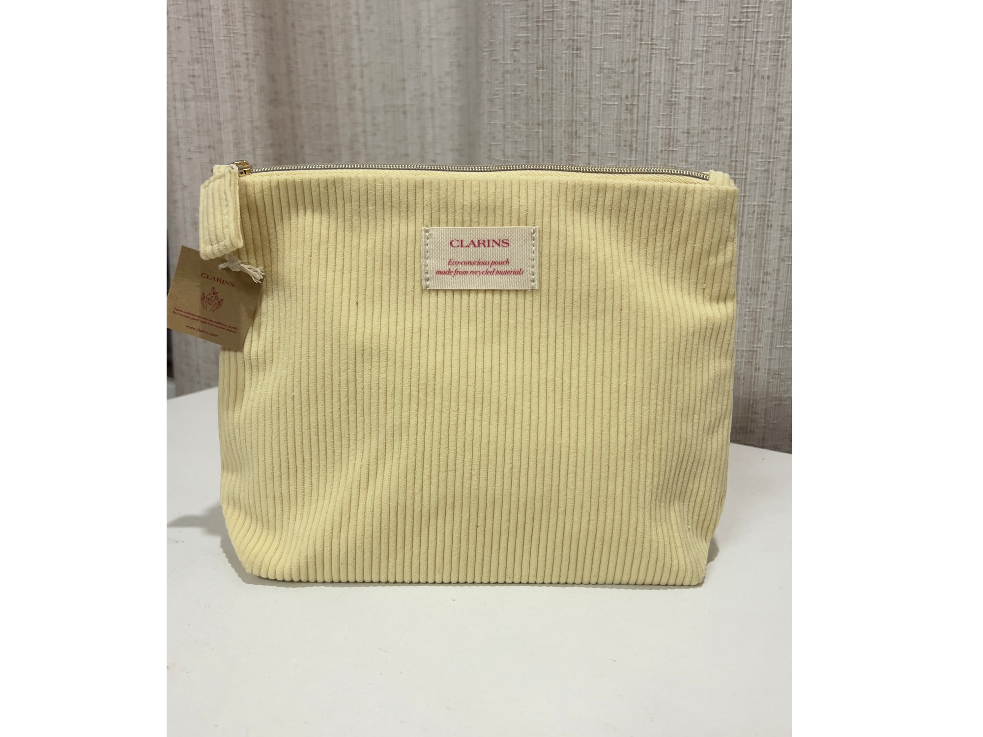 Neceser CLARINS amarilla