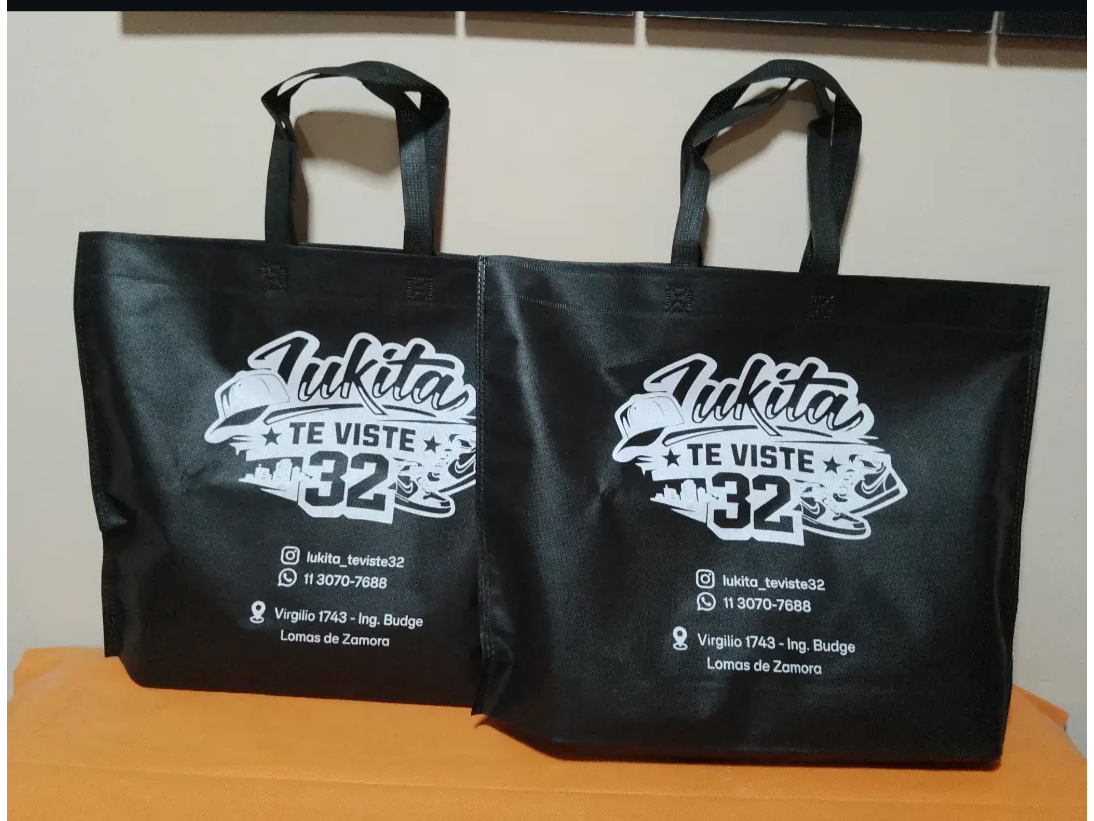 Bolsas de friselina blancas , negras y beige 50x40