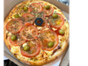 Muzzarella con tomate natural