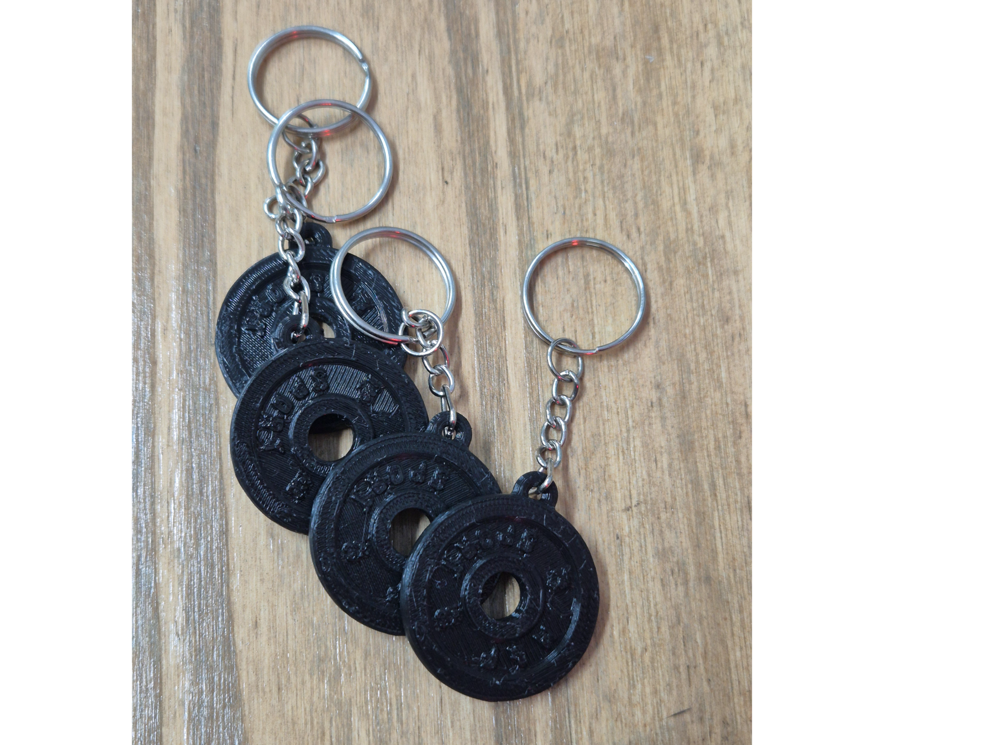 Llavero pesas x10 un