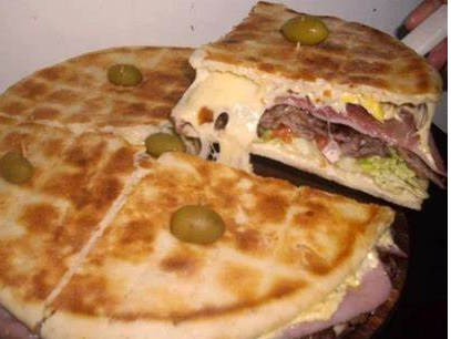 Lomo tamaño Pizza.