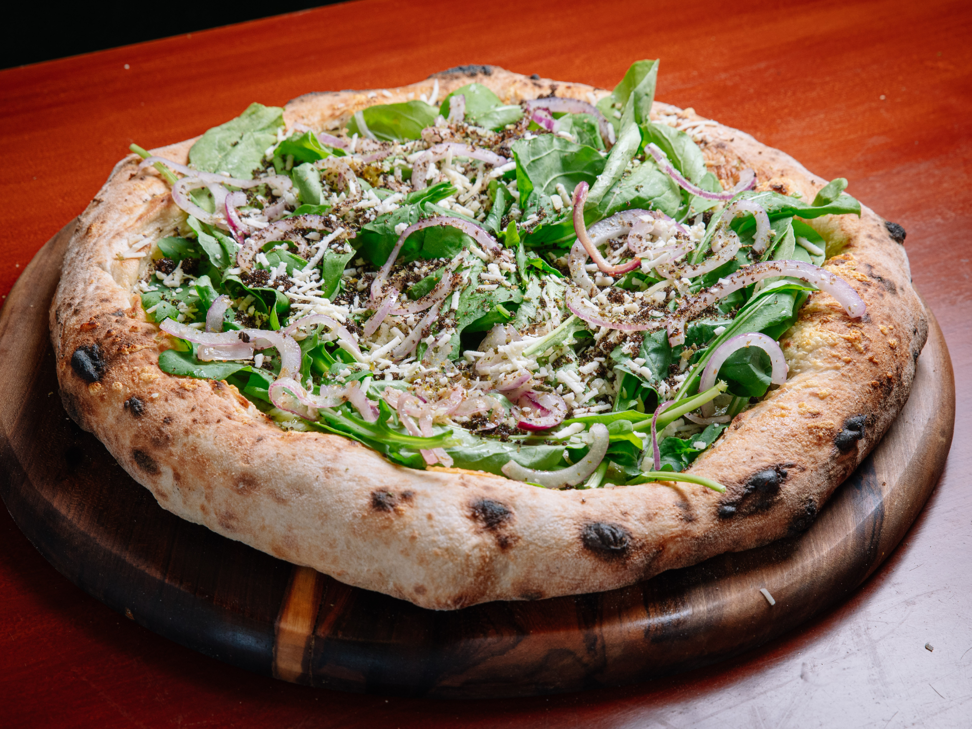 Rúcula cebolla caramelizada