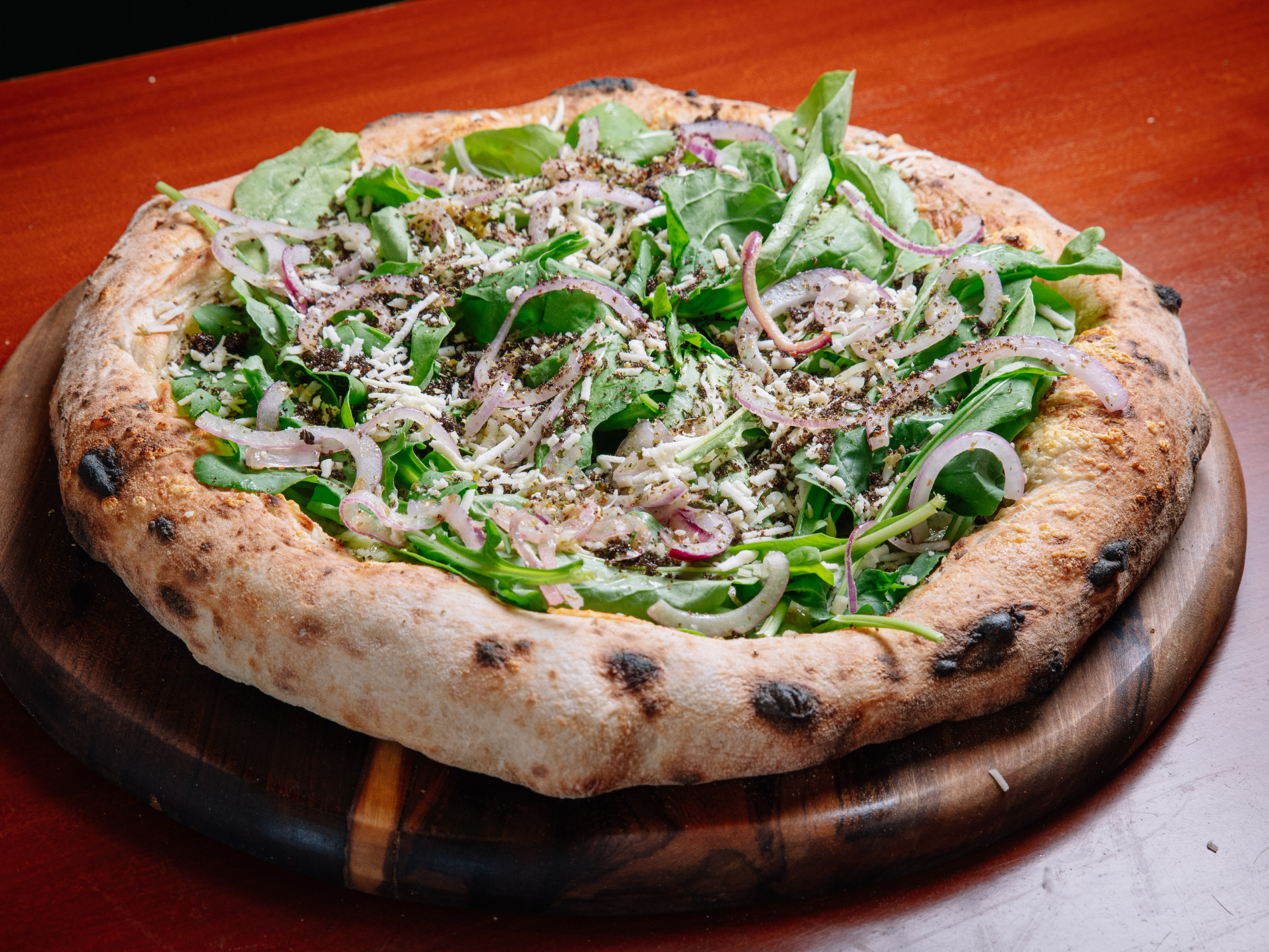 Rúcula cebolla caramelizada