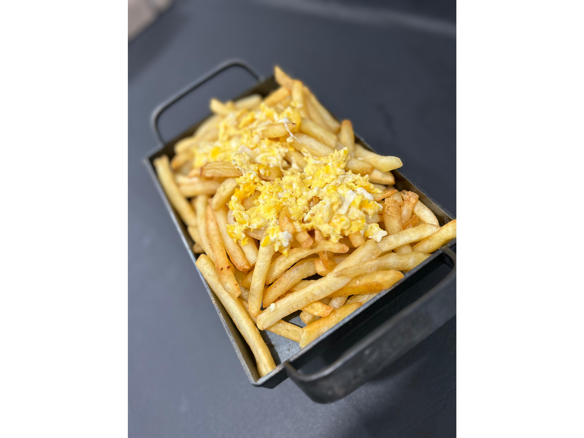Porcion de papas con huevo