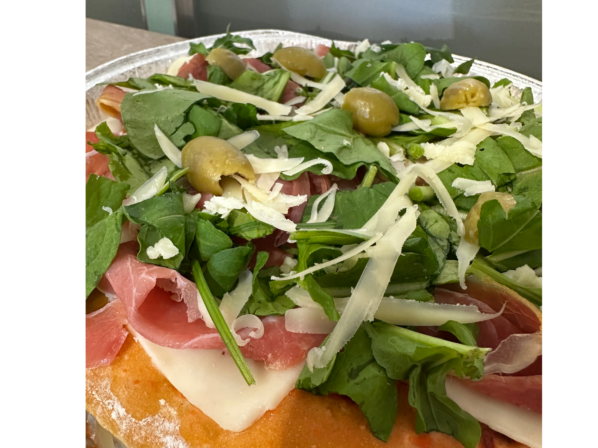 Pizza mediana jamón crudo y rúcula