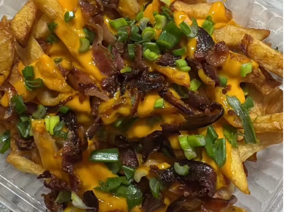 Papas fritas con cheddar