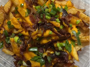 Papas fritas con cheddar de Black Sheep