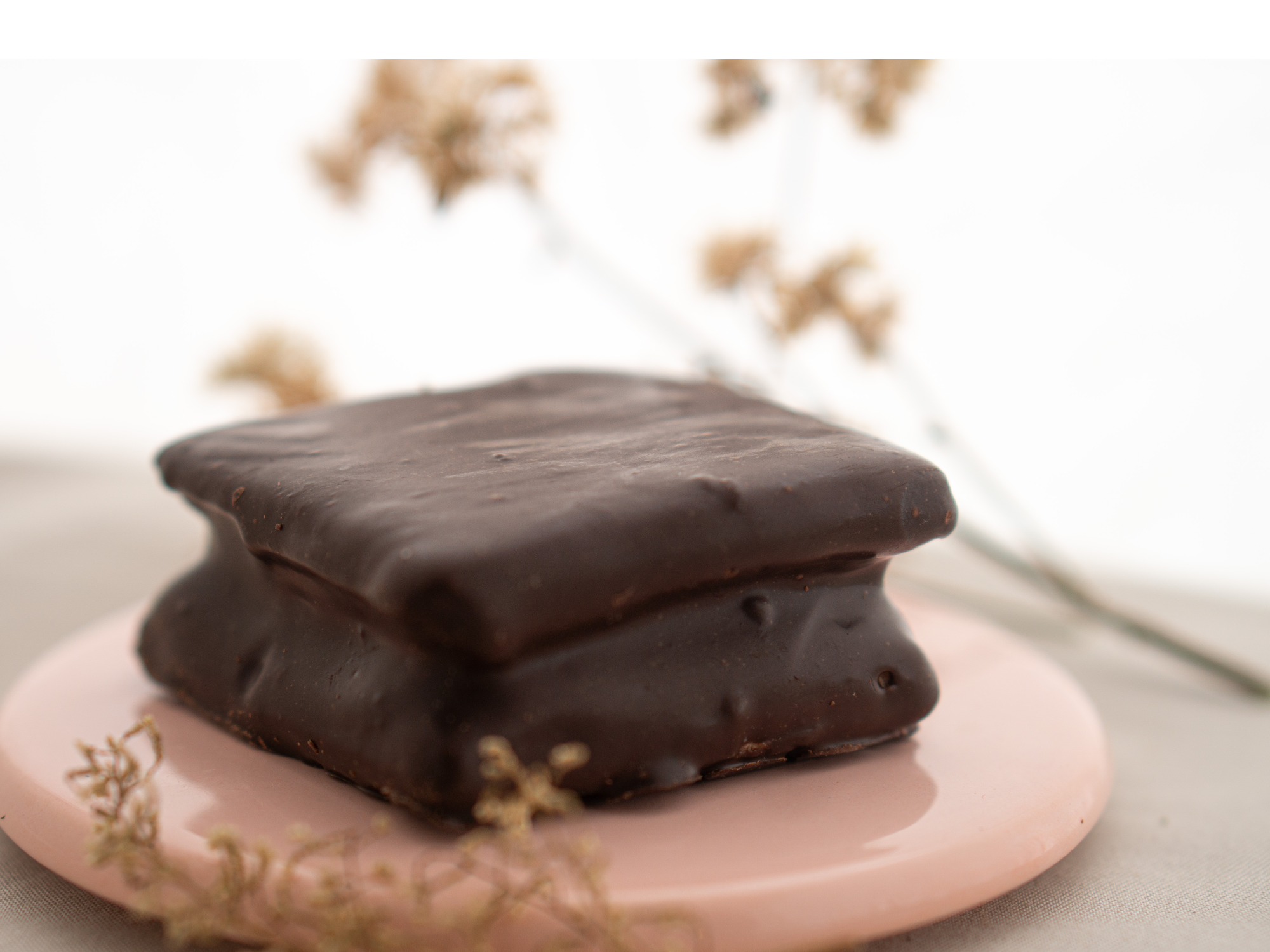 Alfajor de Nuez Bañado en chocolate