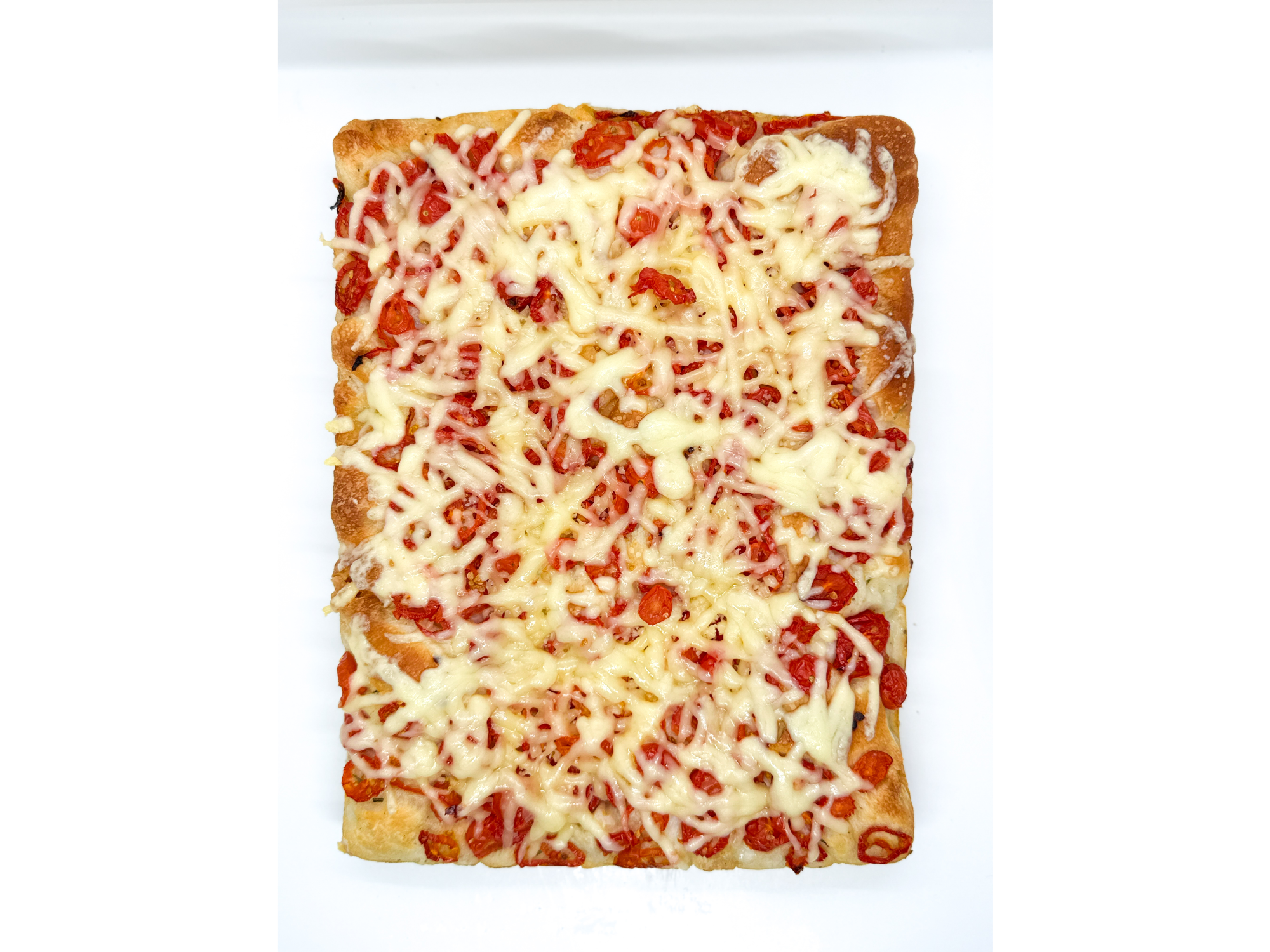 Focaccia PORCIÓN de tomates cherry y queso duro