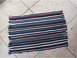 Alfombra tejida tela