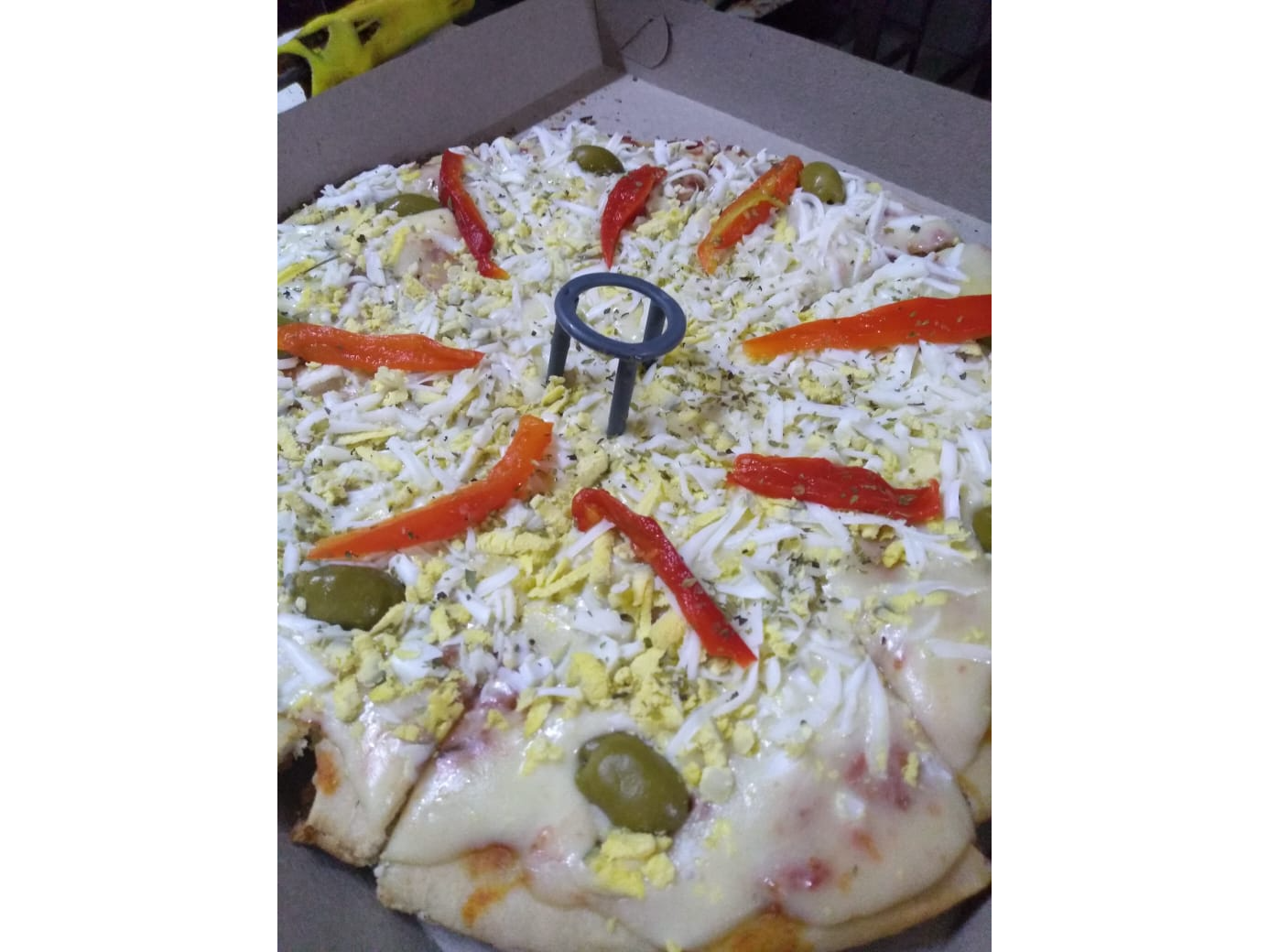 Muzzarella con huevo y morron