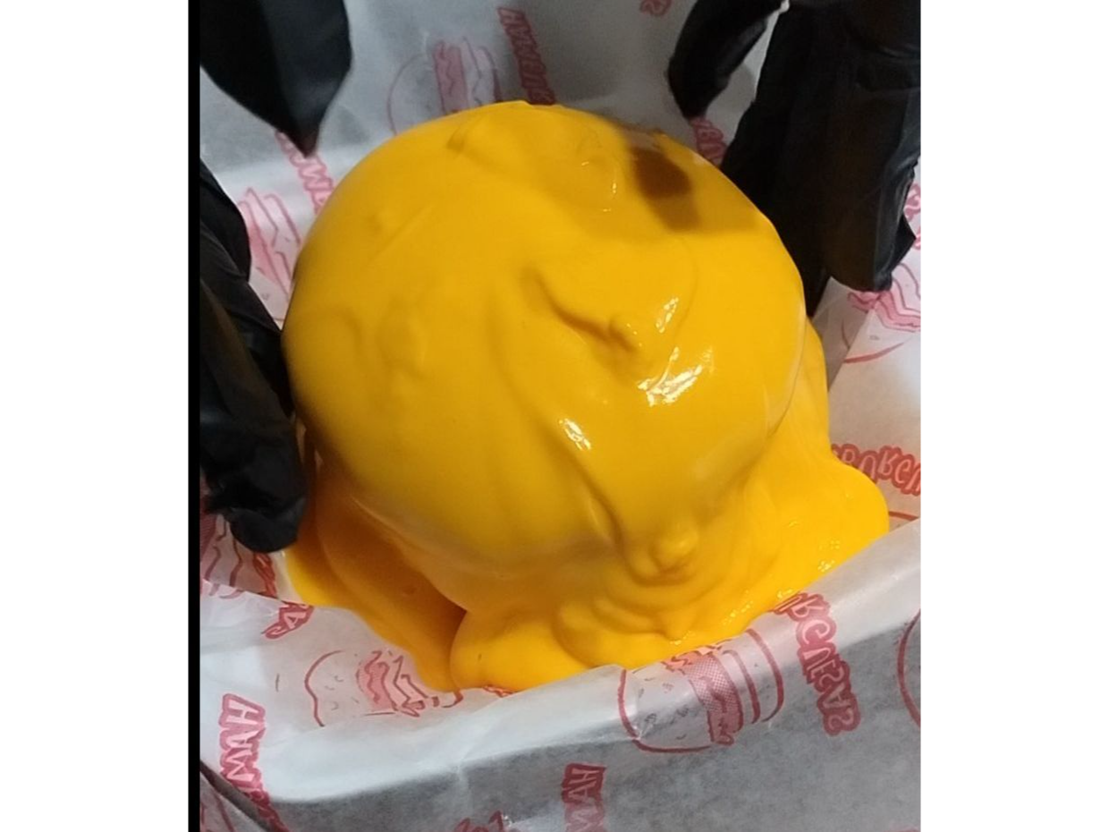 Hamburesa Boom Cheddar + Fritas.