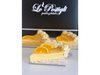 Porcion tarta de queso y naranja