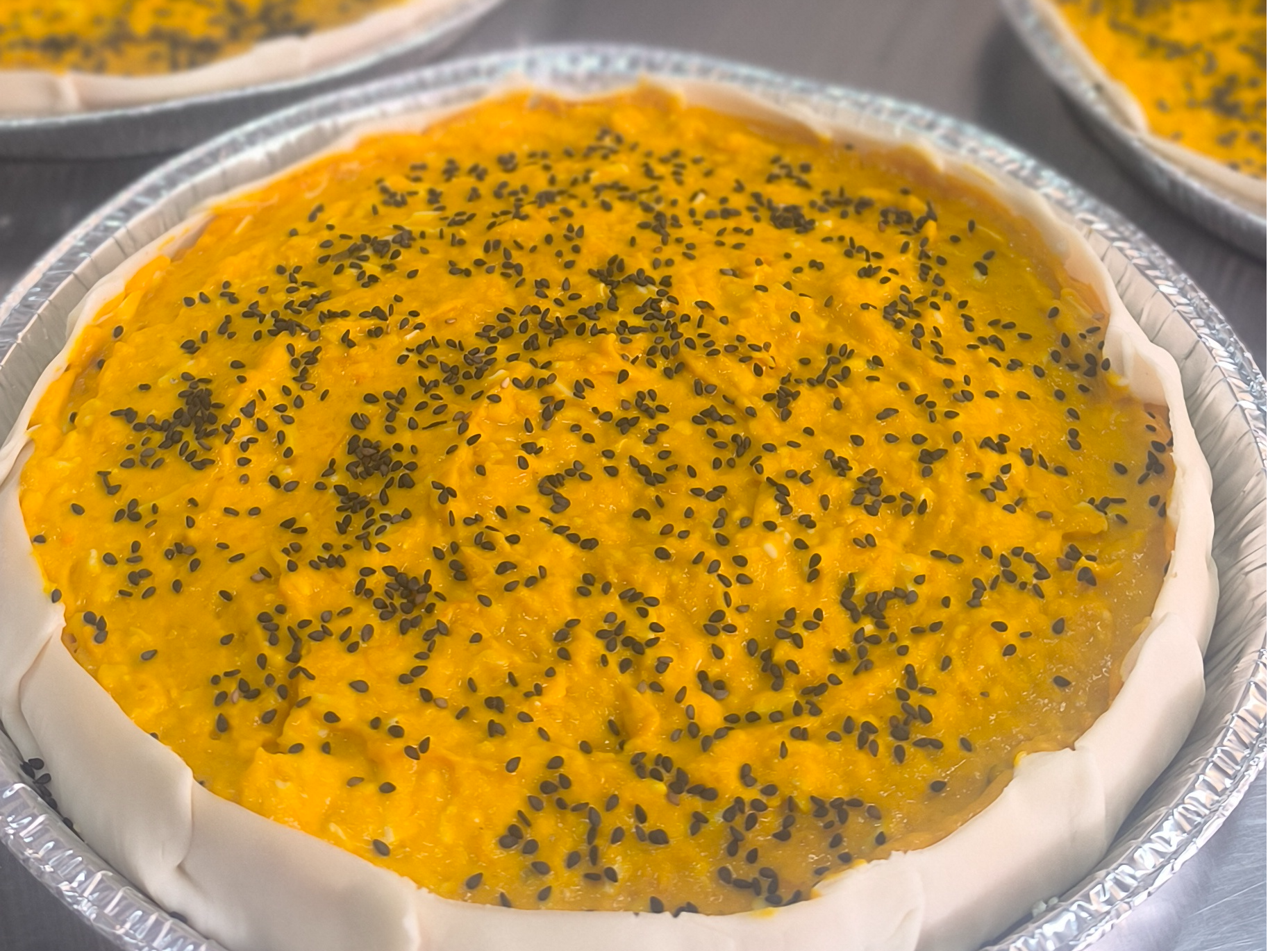 TARTA DE CALABAZA ASADA, QUESO AZUL Y NUECES TOSTADAS.