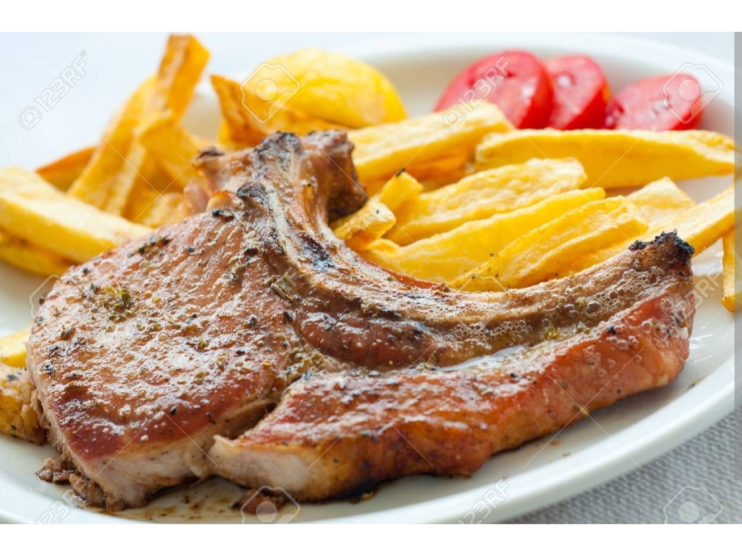 Lunes 14. Chuletas de ternera con Papas  Fritas