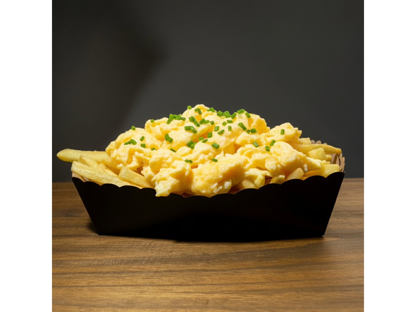 Papas fritas con huevos revueltos