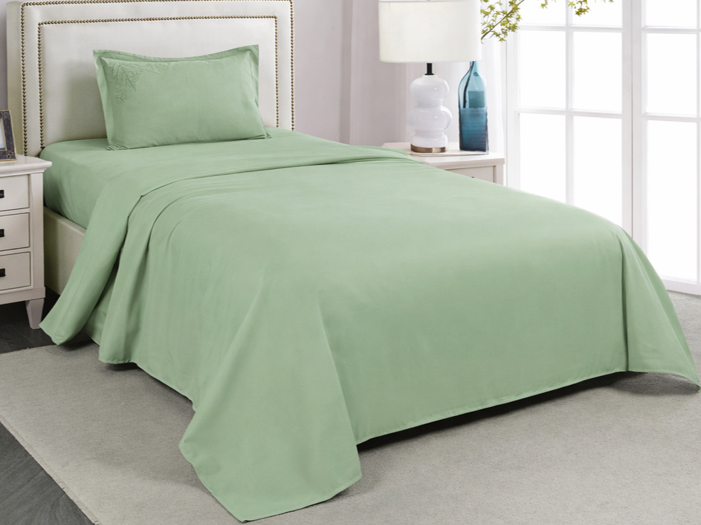 Sábana hotelera Twin verde manzana con bordado de hojas