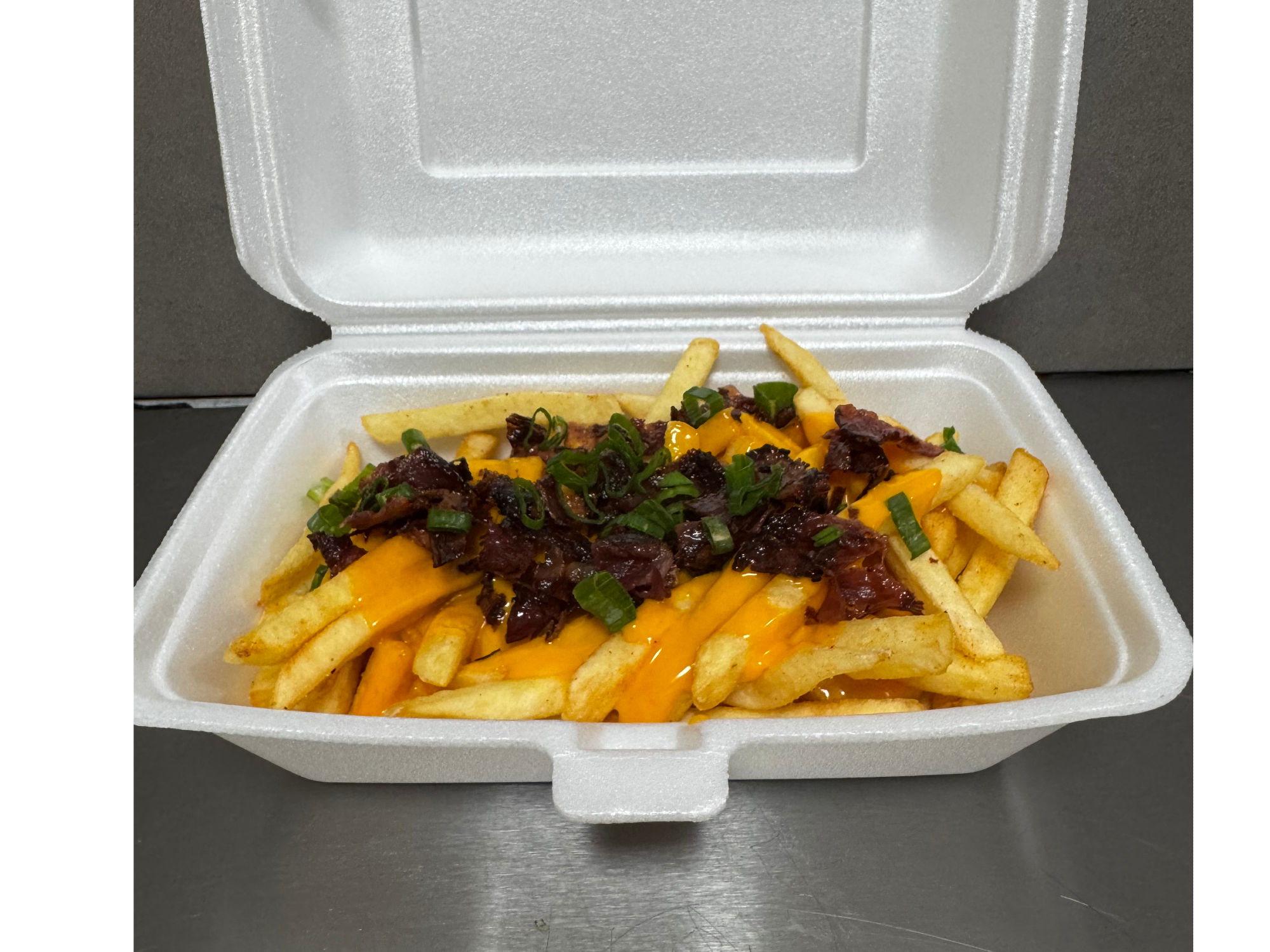 Papas c/cheddar y Bacon + verdeo