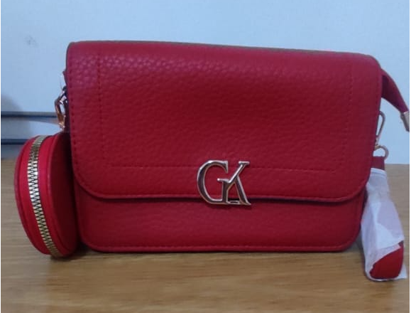MINI BAGS COLOR ROJO CON CORREA DE ALARGUE