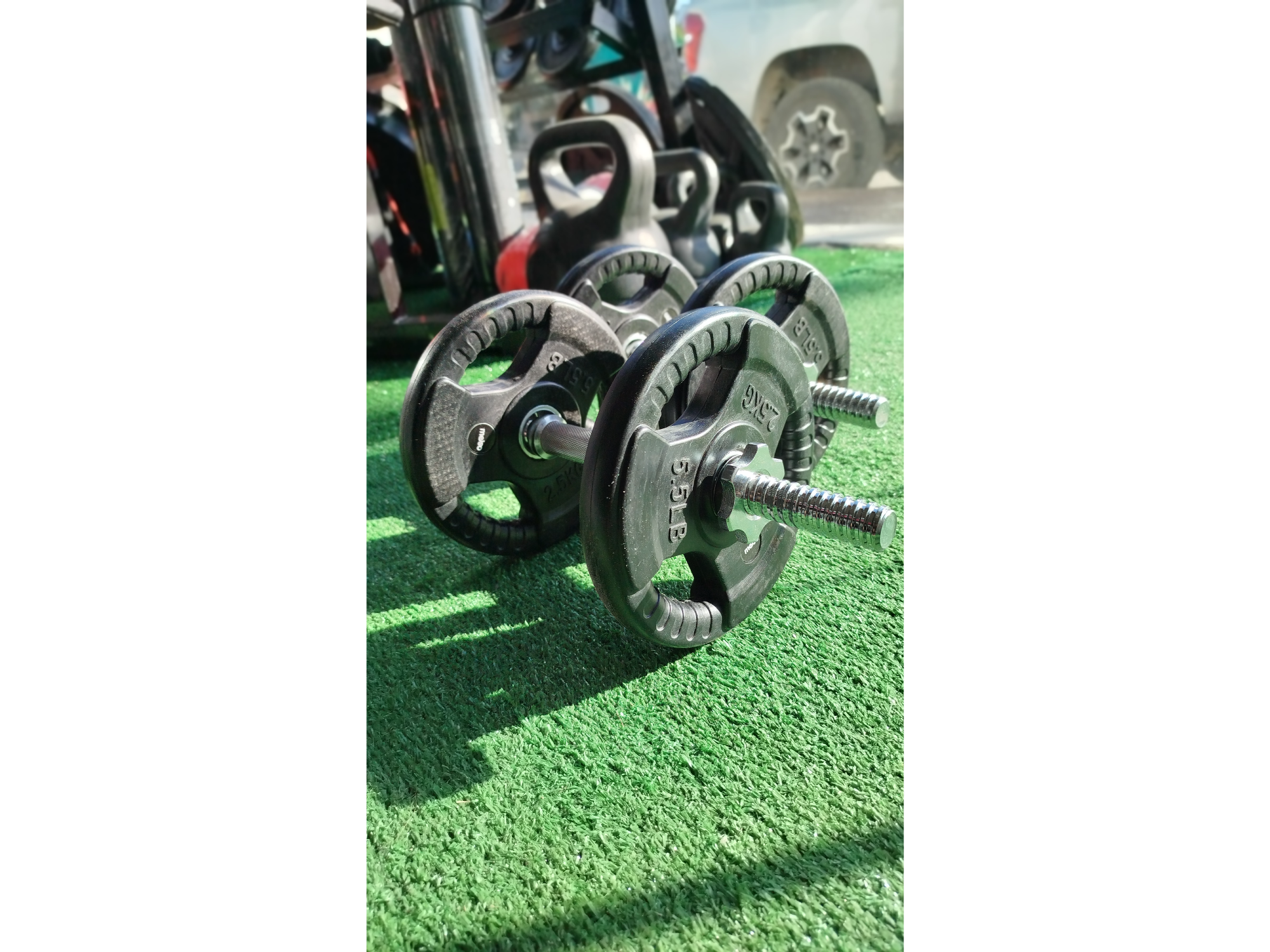 2 mancuernas 25 mm ,38de largo+ 10 kg de discos engomados