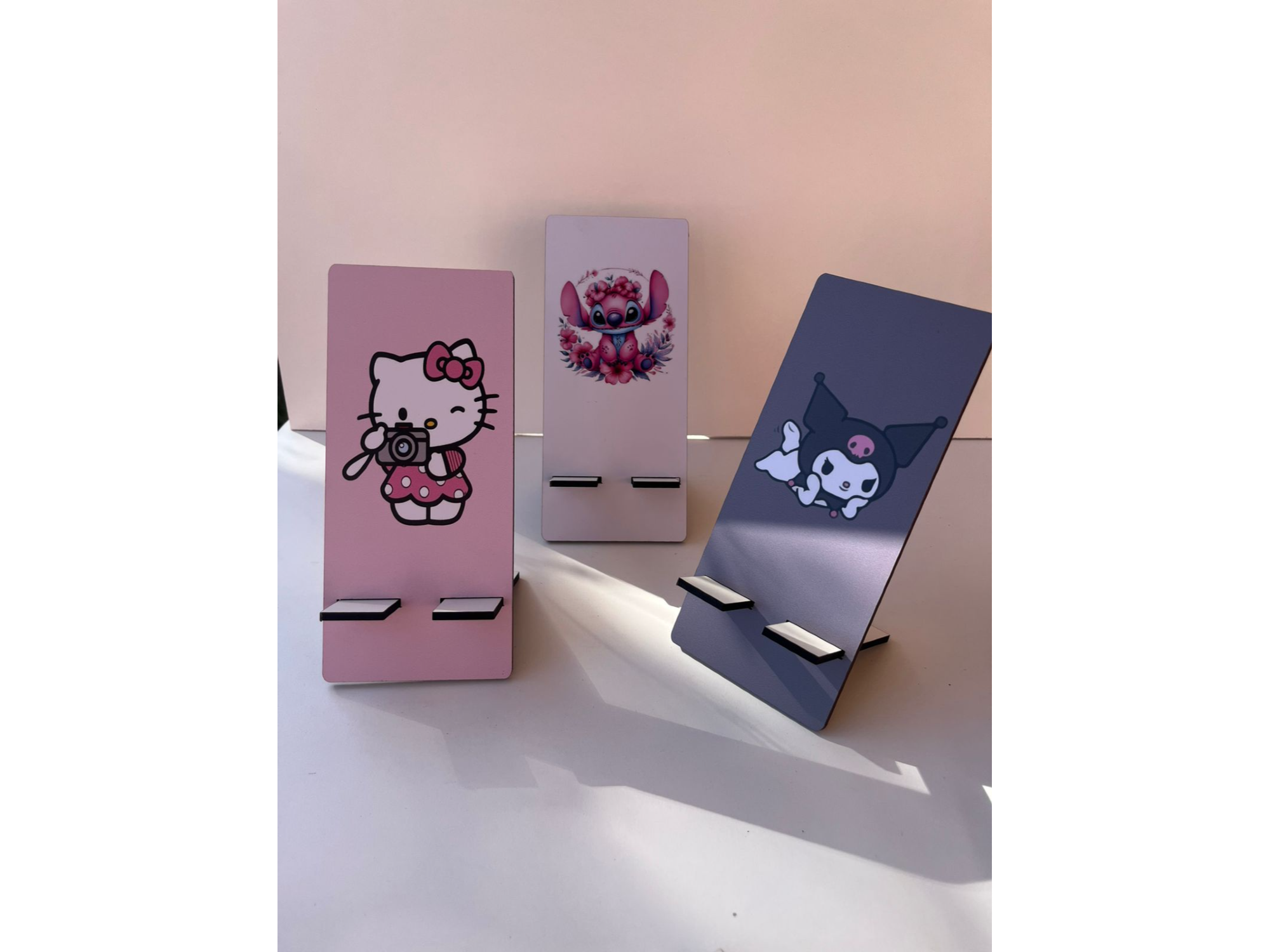 PORTA CELULARES VARIOS DISEÑOS X 24