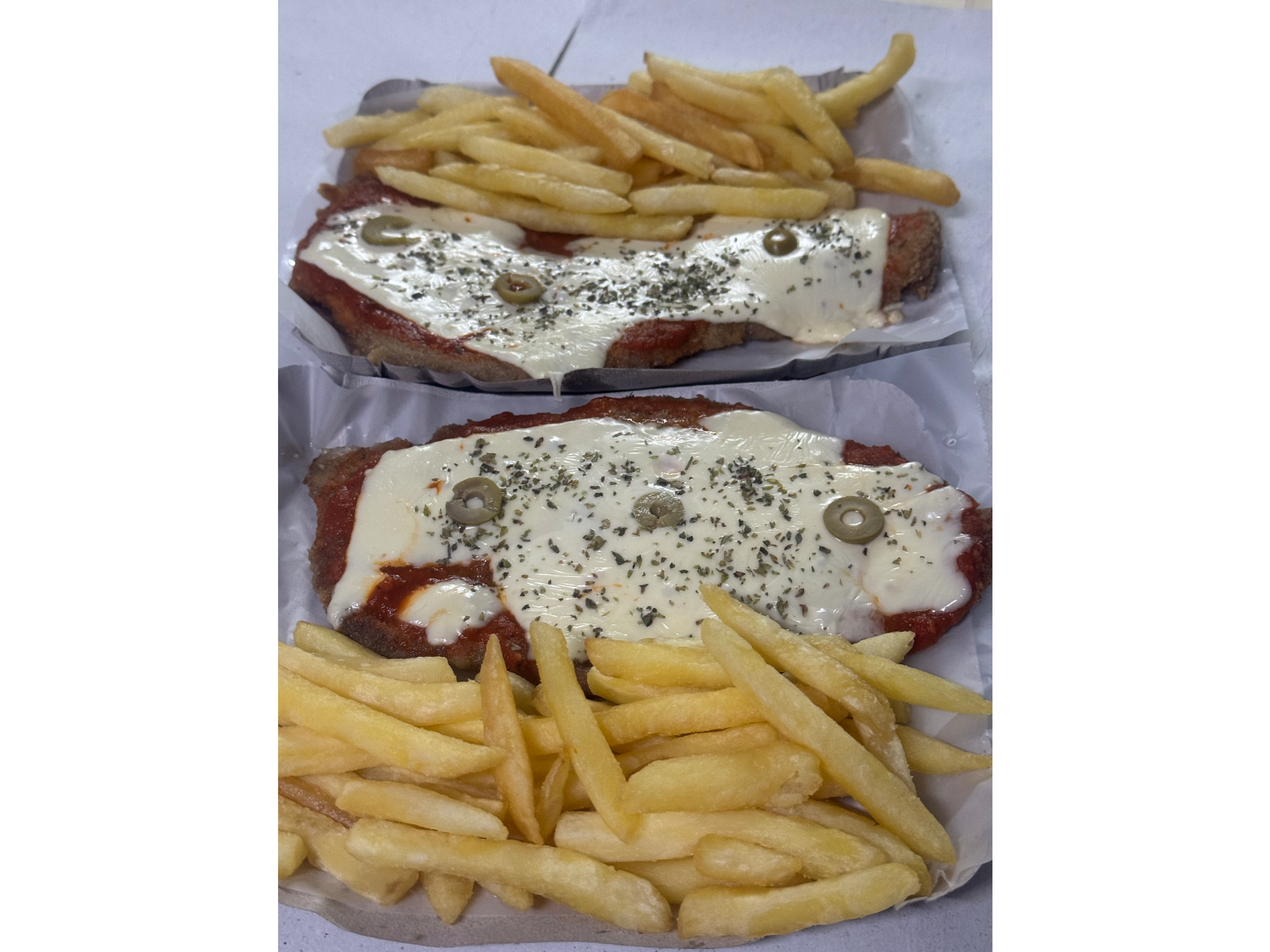 Milanesa de pollo a la pizza