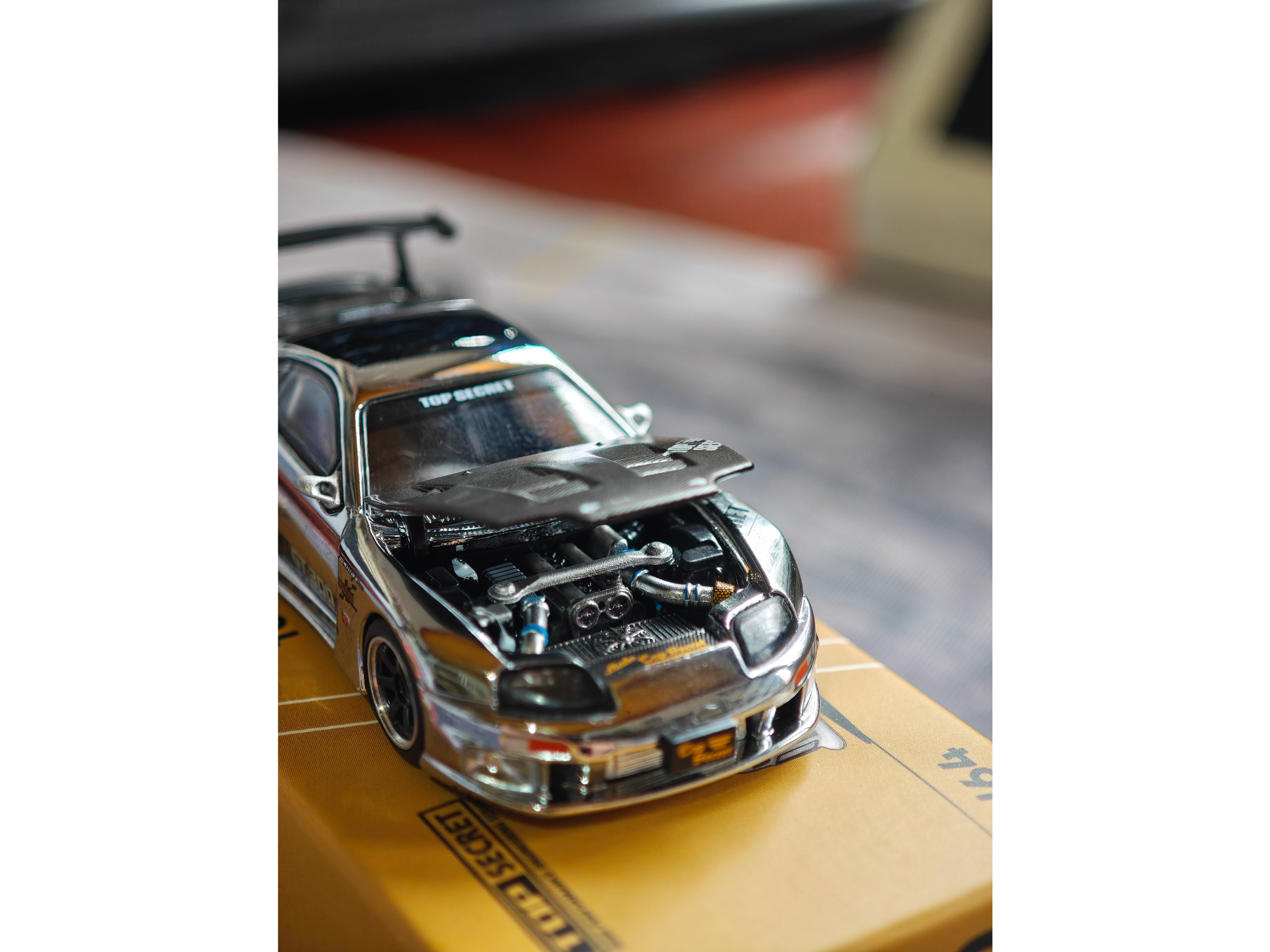 Toyota Supra top secret plateado