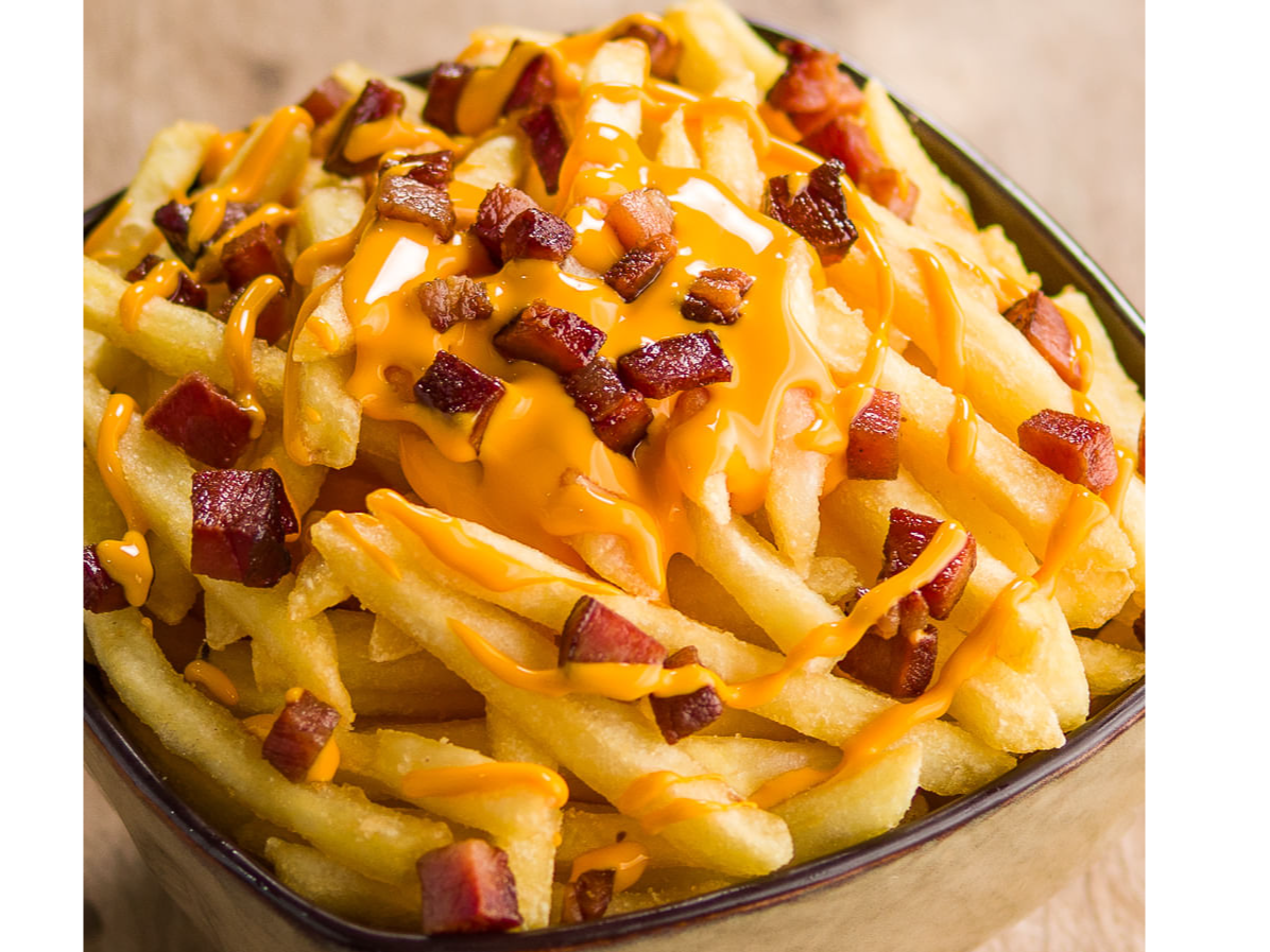 Papas grandes con cheddar y panceta