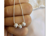 Conjunto tres bolitas arenadas