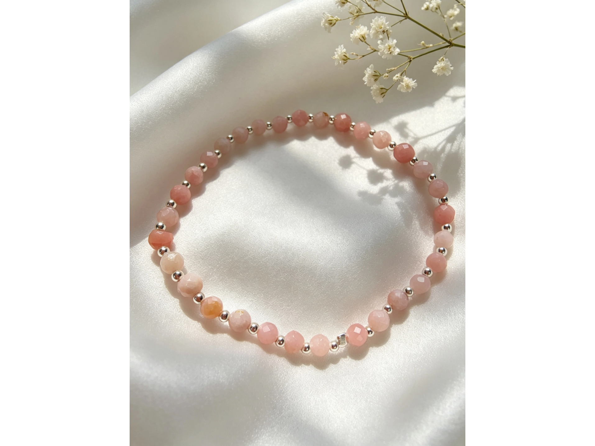 Cuarzo rosa facetada elastizada  PNE004